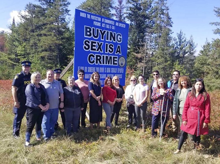 New signage posted by victim services – buying sex is a crime